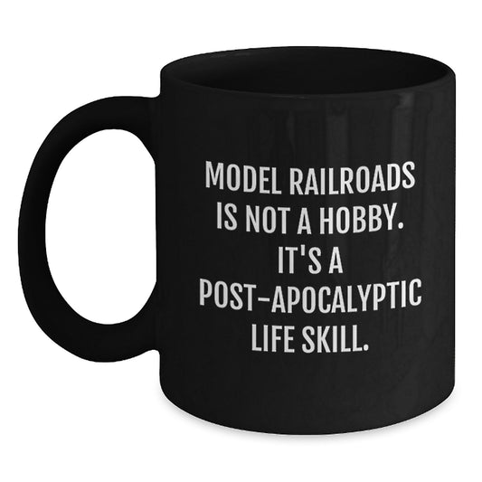 Model Railroads Enthusiasts' Humorous Gift, 'Model Railroads Is Not A Hobby. It's A Post-apocalyptic Life Skill.' Funny Quote Black Coffee Mug from Friends to Model Railroads Lovers - Main