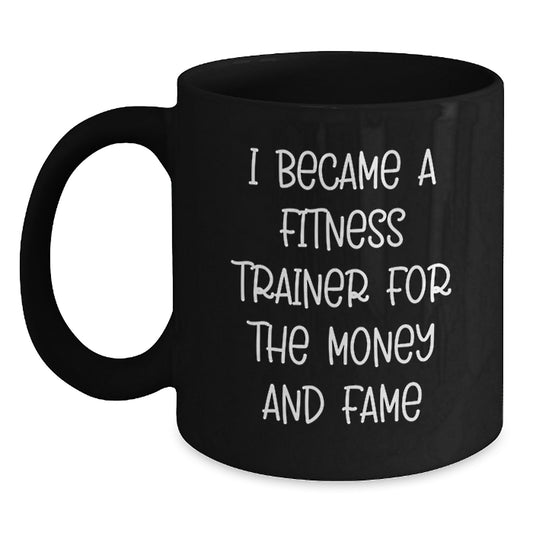 Funny Fitness Trainer Gifts for Men or Women - Commemorate Graduation with a Unique Black Coffee Mug, 'I Became a Fitness Trainer for the Money and Fame' - Main