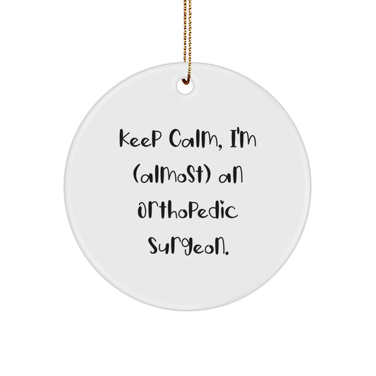 Funny Orthopedic Surgeon Gifts from Friends - 'Keep Calm, I'm (almost) An Orthopedic Surgeon' Christmas Unique Ornament, Circle Shaped - Image 1