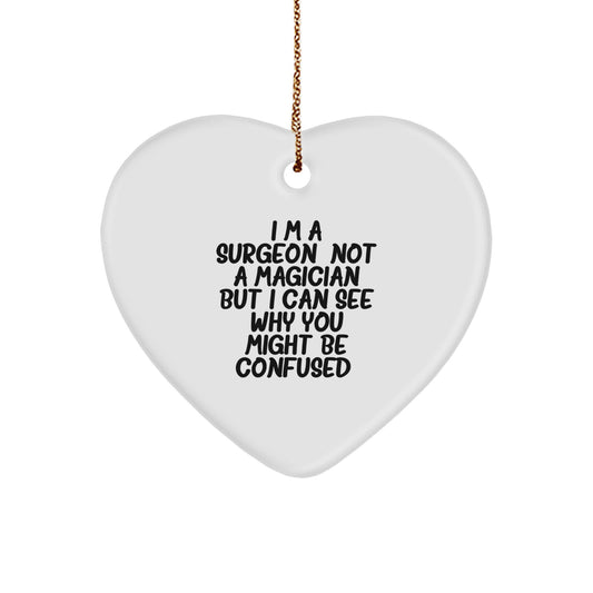 Funny Surgeon Gifts from Friends and Family for Christmas Unique Decorations Heart Ornament, 'I'm A Surgeon. Not A Magician But I Can See Why You Might Be Confused.' - Image 1