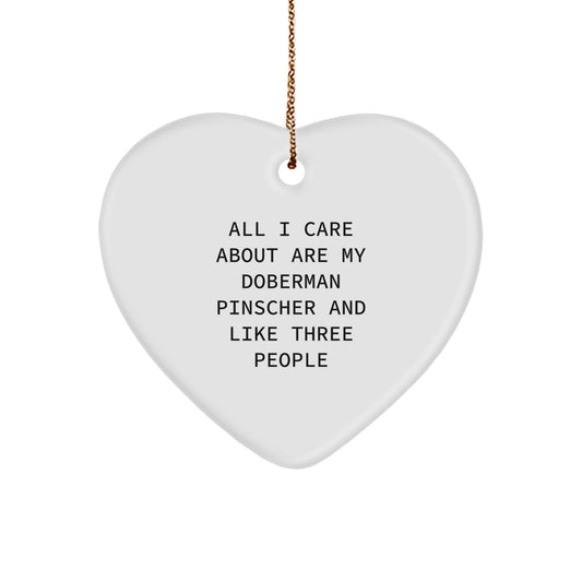 Doberman Pinscher Dog Lover Gifts from Friends for Christmas, Funny Heart Ornament, 'All I Care About Are My Doberman Pinscher And Like Three People', Heart Shaped, White - Image 1