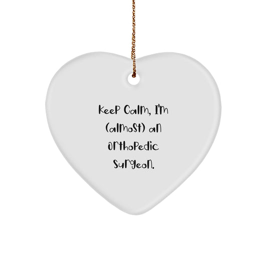 Funny Orthopedic Surgeon Gifts, Heart Ornament for Orthopedic Surgeon, Keep Calm I'm (almost) An Orthopedic Surgeon Christmas Unique Ornaments for Friends Family Coworkers - Image 1