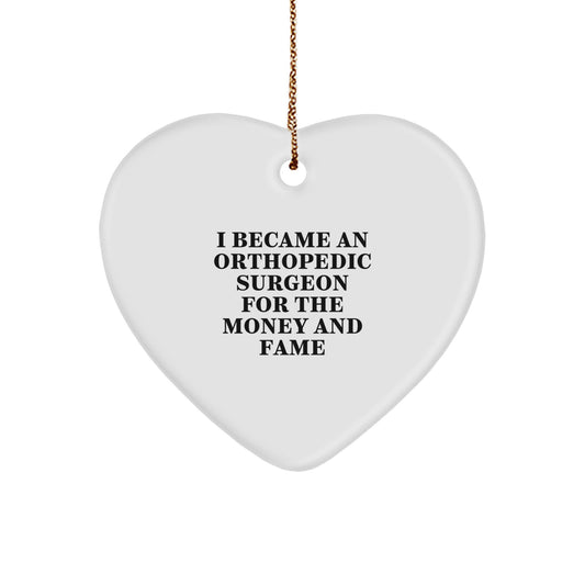 Funny Orthopedic Surgeon Gifts from Men for Christmas Unique Heart Ornament, I Became An Orthopedic Surgeon For The Money And Fame, Heart Shaped - Image 1