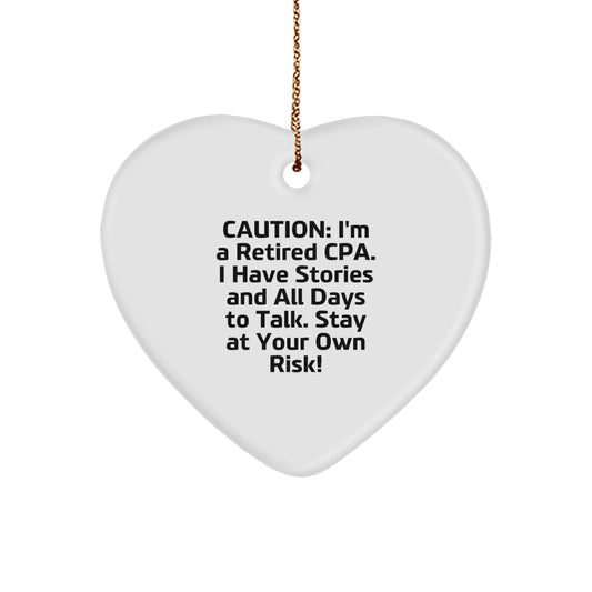 Funny CPA Gifts from Friends for Christmas - Heart Ornament with Quote: 'Caution: I'm A Retired CPA. I Have Stories And All Days To Talk. Stay At Your Own Risk!' - Image 1