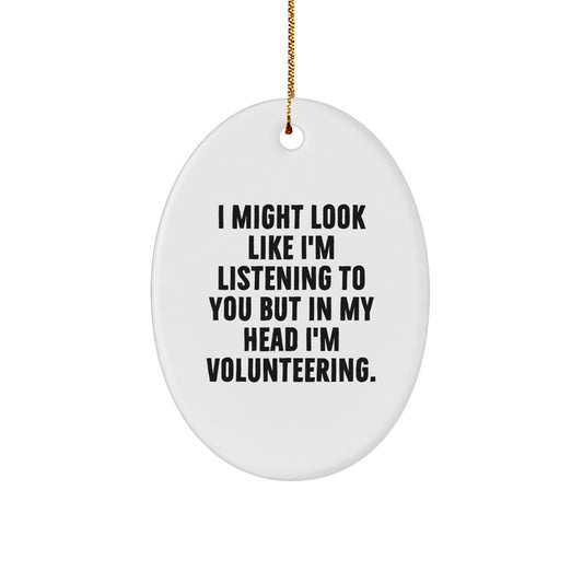 Funny Volunteering Gifts from Friends for Christmas Oval Ornament, I Might Look Like I'm Listening To You But In My Head I'm Volunteering. - Image 1