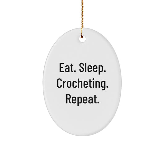 Funny Crocheting Gifts for Women, Oval Ornament with Eat. Sleep. Crocheting. Repeat. Motto for Friends & Family this Christmas - Image 1