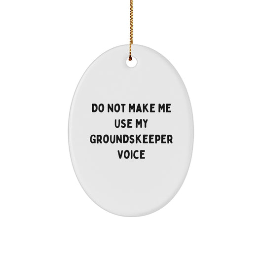 Christmas Gift Groundskeeper Christmas Ornament - A Playful Present - Image 1