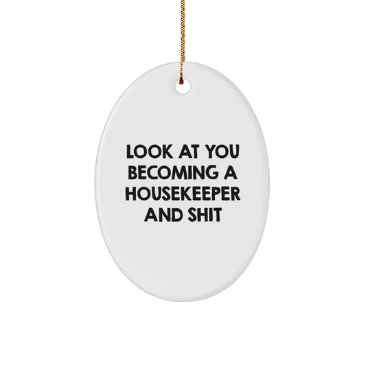 Funny Housekeeper Gifts from Friends, Housekeeper Oval Ornament with Look At You Becoming A 'Housekeeper' And Shit Quote, Christmas Unique Decorations for Housekeeper Home - Image 1