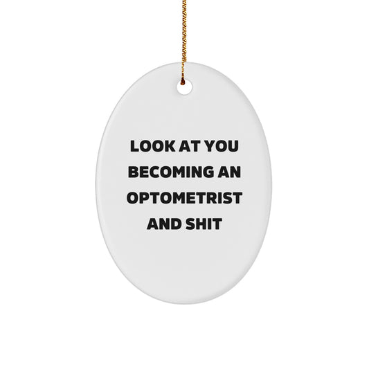 Gifts from Friends to Optometrist - Funny Oval Ornament, Christmas Unique Gifts for him - Look At You Becoming An Optometrist And Shit - Image 1