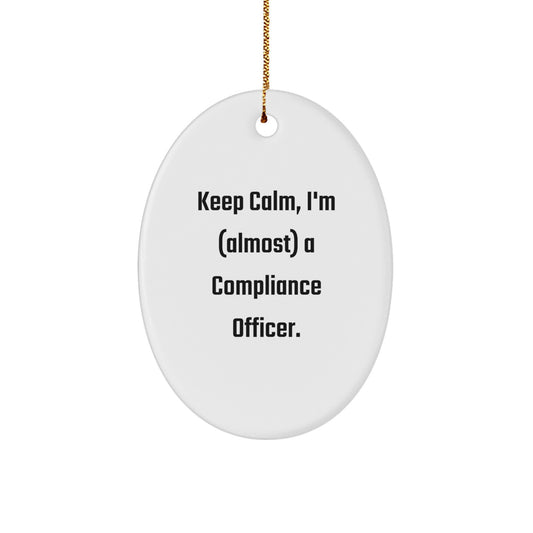 Funny Compliance Officer Gifts from Men to Friends - Keep Calm, I'm (almost) A Compliance Officer. Oval Ornament for Christmas - Image 1