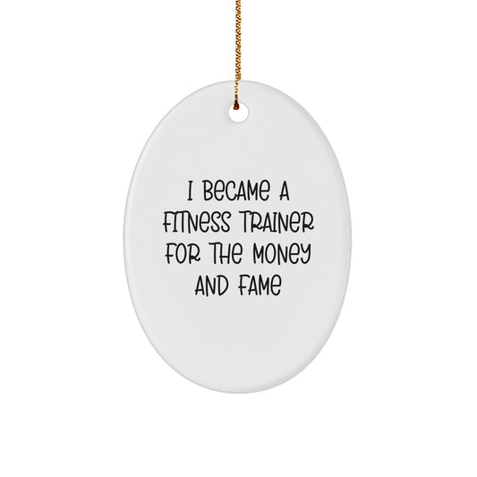 Funny Fitness Trainer Gifts for Men - 'I Became A Fitness Trainer For The Money And Fame' Oval Ornament, White, 3.25' Tall, Perfect for Coworkers, Friends, and Family - Image 1